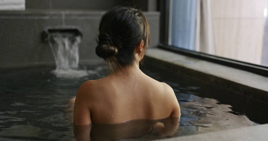 Woman enjoy onsen