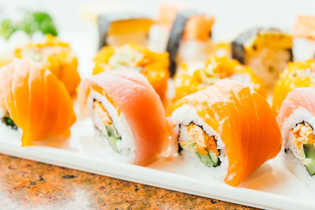 Selective focus point on sushi roll and maki - Japanese food style