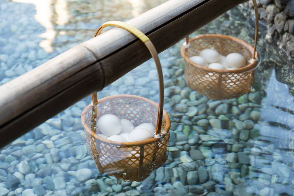 Japanese hot spring steam boil eggs inside basket
